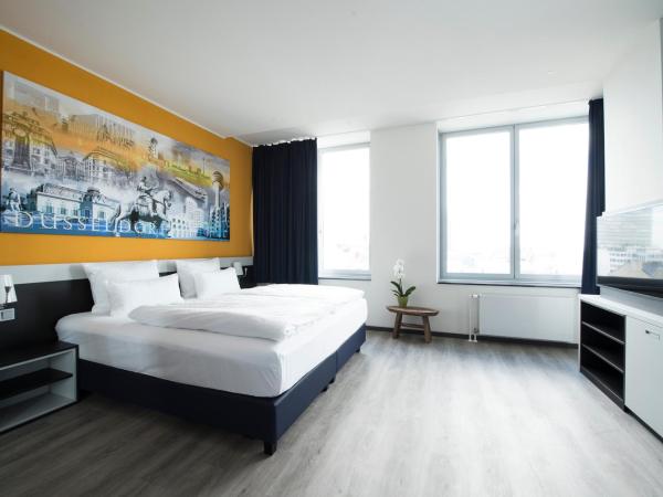 Carathotel Düsseldorf City : photo 2 de la chambre suite