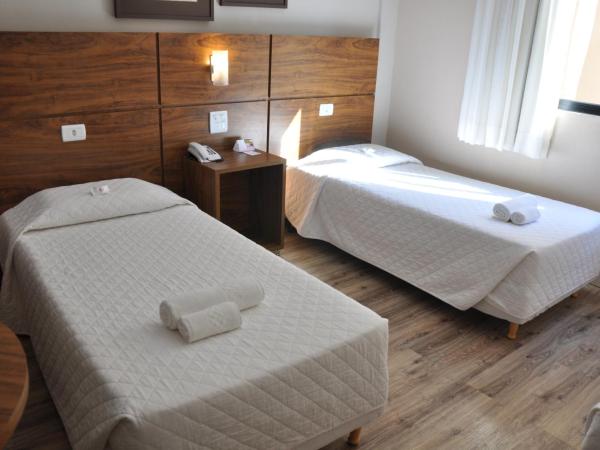 SJ Executive - San Juan Curitiba : photo 1 de la chambre chambre triple exécutive