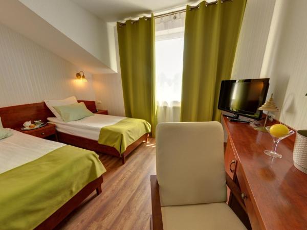 Hotel Leopolis : photo 1 de la chambre chambre simple standard