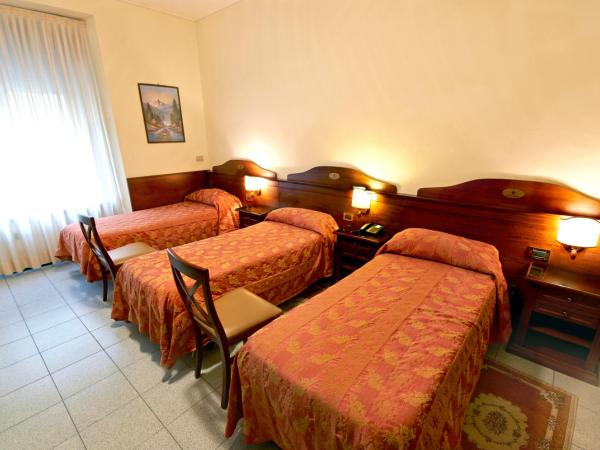 Hotel Pavone : photo 1 de la chambre chambre triple