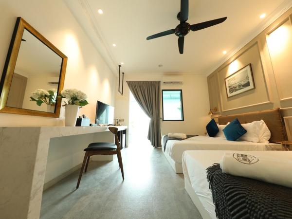 Manhattan Residence By Reunion : photo 6 de la chambre chambre exécutive avec 2 lits queen-size