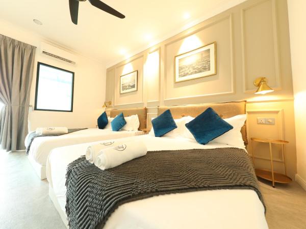 Manhattan Residence By Reunion : photo 5 de la chambre chambre exécutive avec 2 lits queen-size