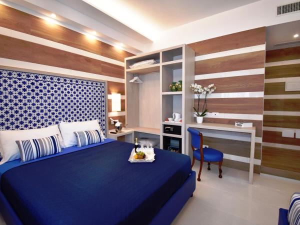 Melody Sorrento Suites : photo 9 de la chambre chambre triple classique