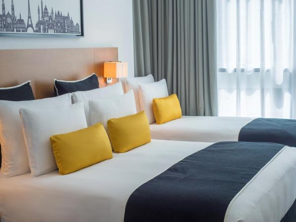 TRYP by Wyndham Dubai : photo 1 de la chambre chambre triple avec accès au club de plage soluna