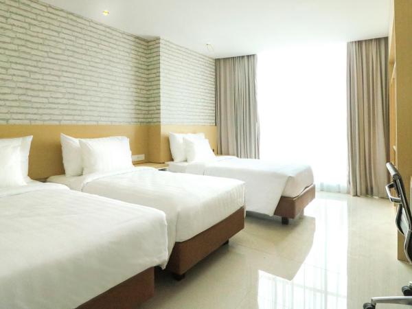 PALM PARK Hotel Surabaya : photo 5 de la chambre chambre triple deluxe