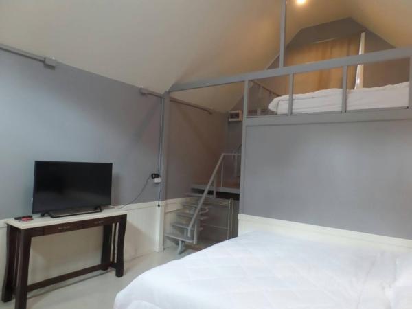 Baan JaoKorKluay บ้านเจ้ากอกล้วย : photo 3 de la chambre bungalow - vue sur jardin