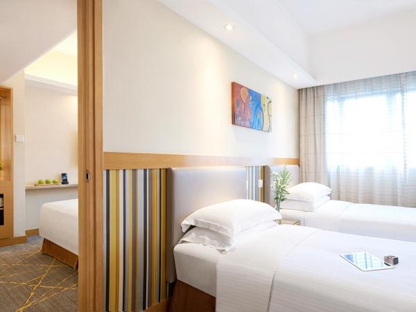 The Cityview - Chinese YMCA of Hong Kong : photo 3 de la chambre deluxe quad (four singles)