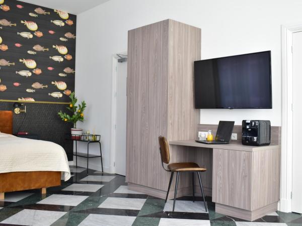 Brasss Hotel Suites : photo 8 de la chambre suite exécutive ocean by night