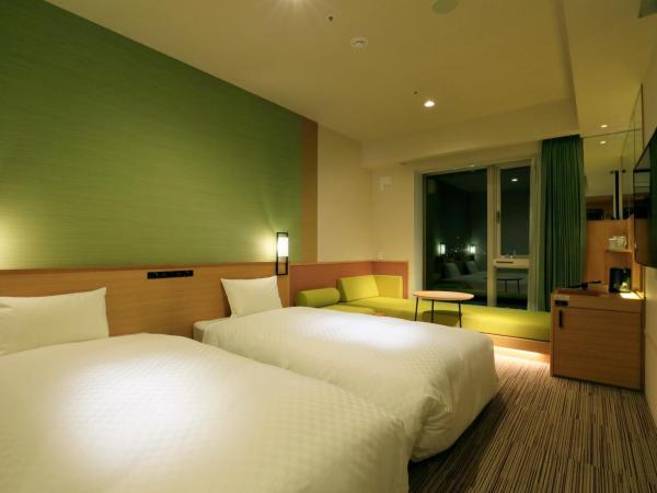 THE SINGULARI HOTEL & SKYSPA at UNIVERSAL STUDIOS JAPAN : photo 4 de la chambre chambre lits jumeaux standard avec canapé-lit - non-fumeurs - vue sur fleuve