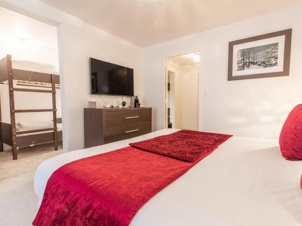 Madame Vacances Hôtel & Spa Le Mottaret : photo 1 de la chambre chambre quadruple confort