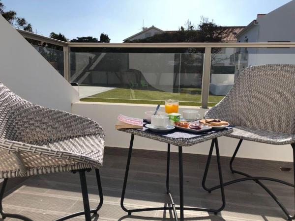 Silver Seahorse Garden Retreat : photo 4 de la chambre chambre double deluxe avec balcon