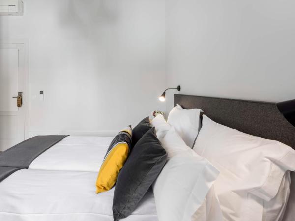 Penedo da Saudade Suites & Hostel : photo 1 de la chambre chambre lits jumeaux