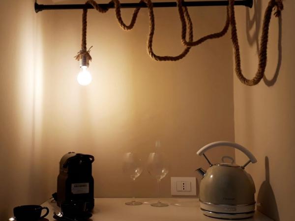 MammaDada charm rooms : photo 6 de la chambre chambre double deluxe avec lit d'appoint