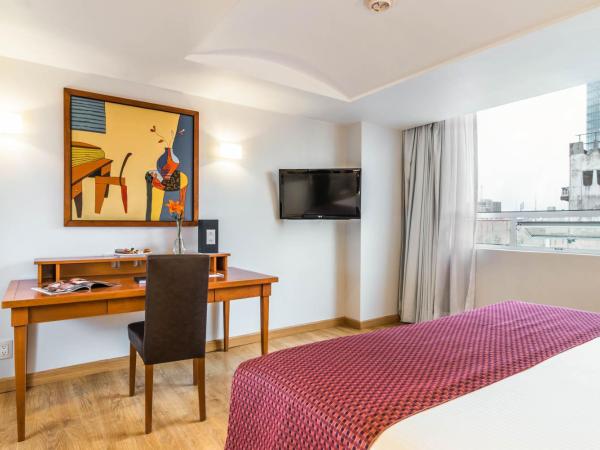 Eurostars Zona Rosa Suites : photo 6 de la chambre suite junior avec lit king-size