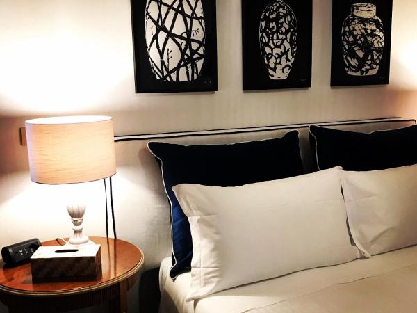 Marunnella Suites : photo 1 de la chambre suite familiale