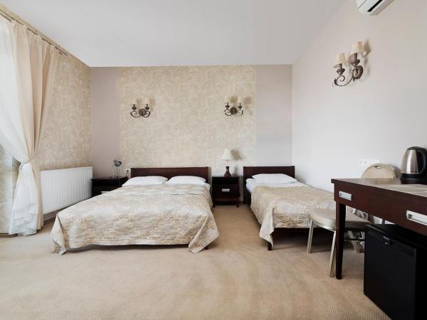 Hotel Pod Kasztanami : photo 2 de la chambre appartement