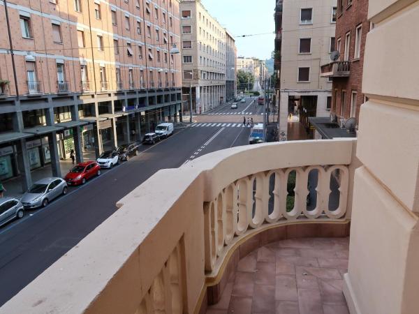 Maglo Station : photo 3 de la chambre chambre triple - vue sur ville