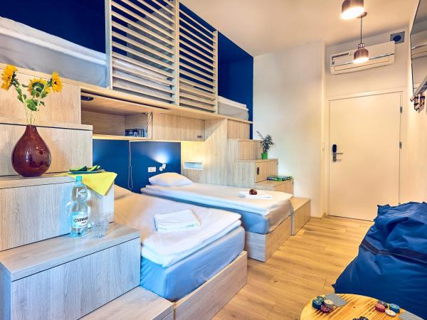 Draggo House : photo 4 de la chambre chambre quadruple avec salle de bains privative