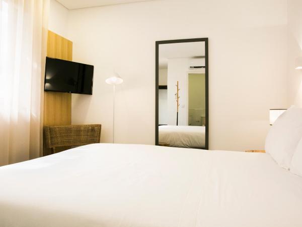 BO - Álvares Cabral GuestHouse : photo 2 de la chambre chambre double - vue sur jardin