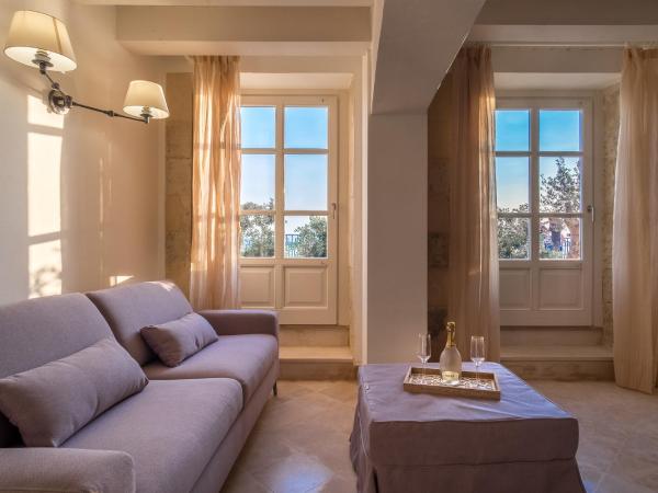 Palazzo Alfeo Aparthotel : photo 2 de la chambre appartement - rez-de-chaussée