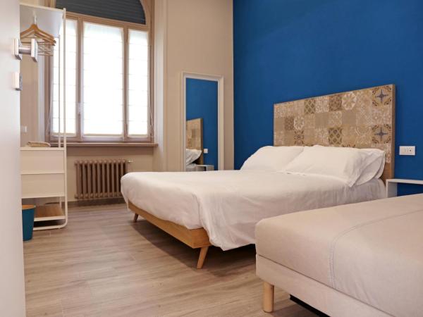 APP9 - rooms and apartments : photo 2 de la chambre chambre triple avec salle de bains privative séparée