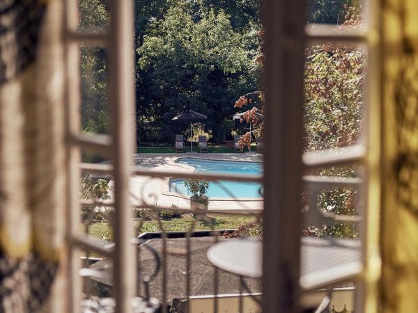 Castel Bois Marie, Maison d'hôtes : photo 5 de la chambre chambre double ou lits jumeaux deluxe - vue sur piscine