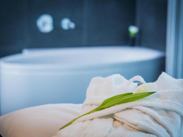 LINDEMANN'S : photo 3 de la chambre hébergement bain urbain