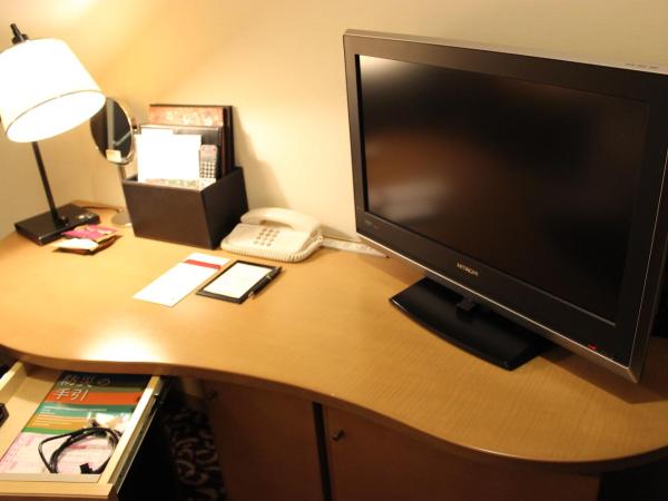 Hotel Ryumeikan Tokyo : photo 2 de la chambre chambre double Économique avec petit lit double
