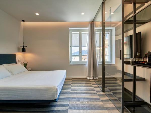 WALLURE - Tickled Hotel & Wellness : photo 10 de la chambre chambre deluxe - vue sur ville