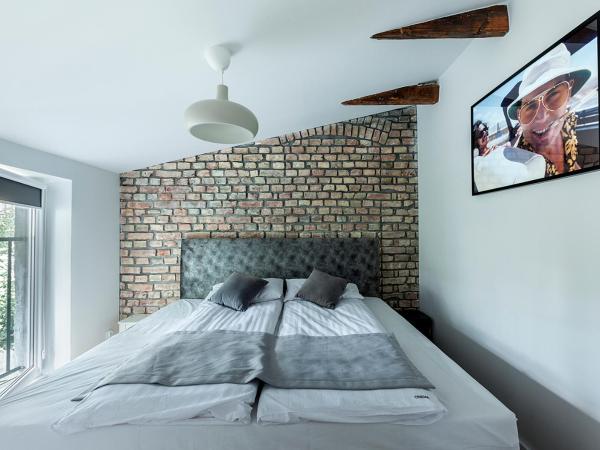 Cinema Apartments : photo 4 de la chambre suite deluxe avec lit king-size