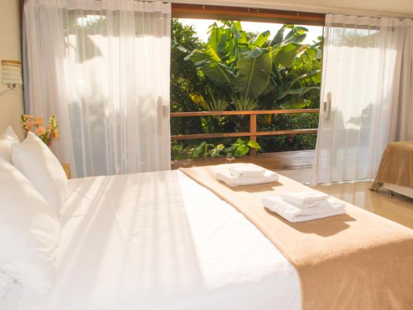 Pousada Blue Ocean : photo 2 de la chambre chambre quadruple - vue sur jardin