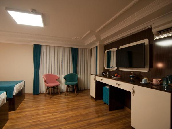 Akbiyik Suite Boutique Hotel : photo 7 de la chambre chambre triple supérieure