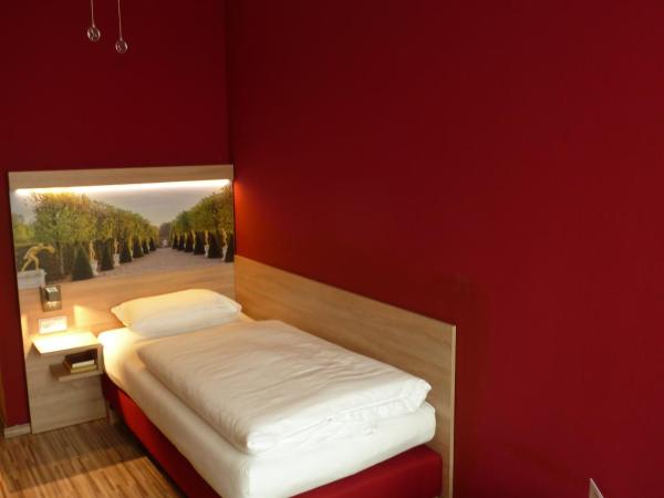 City Hotel Hannover : photo 4 de la chambre chambre simple avec salle de bains