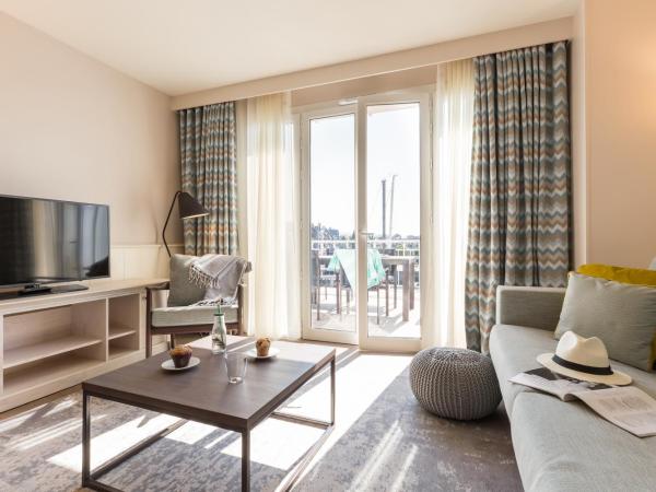 Résidence Pierre & Vacances Premium Presqu'Ile de la Touques : photo 6 de la chambre appartement 2 chambres en duplex avec terrasse ou balcon (6 personnes) - bâtiments de la capitainerie