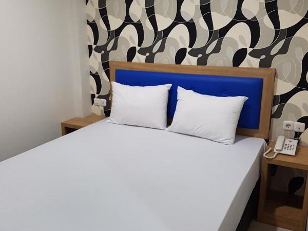 Ethan Hotel Kelapa Gading : photo 3 de la chambre chambre double deluxe