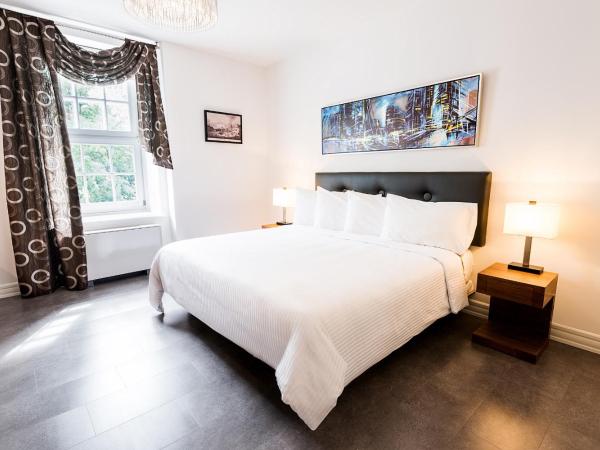 Hotel Manoir Morgan : photo 1 de la chambre chambre lit king-size deluxe