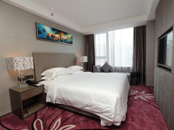 La Perle International Hotel - Free shuttle between hotel and Exhibition Center during Canton Fair & Exhibitor registration Counter : photo 3 de la chambre comfort king room