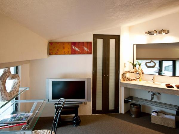 Aztic Hotel and Executive Suites : photo 5 de la chambre chambre exécutive lit queen-size