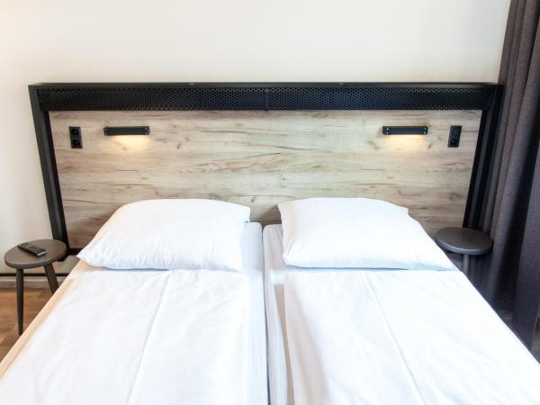 a&o Berlin Mitte : photo 5 de la chambre chambre lits jumeaux