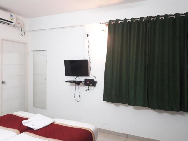 SAP Golden Grande Electronic City : photo 4 de la chambre chambre double standard