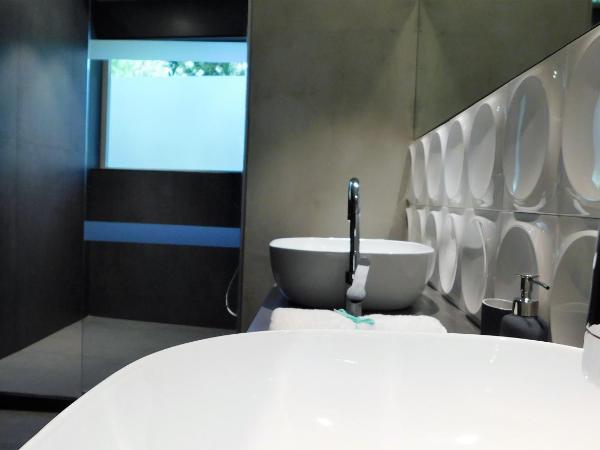 101 Adrianou Apartments : photo 10 de la chambre suite supérieure - vue sur jardin