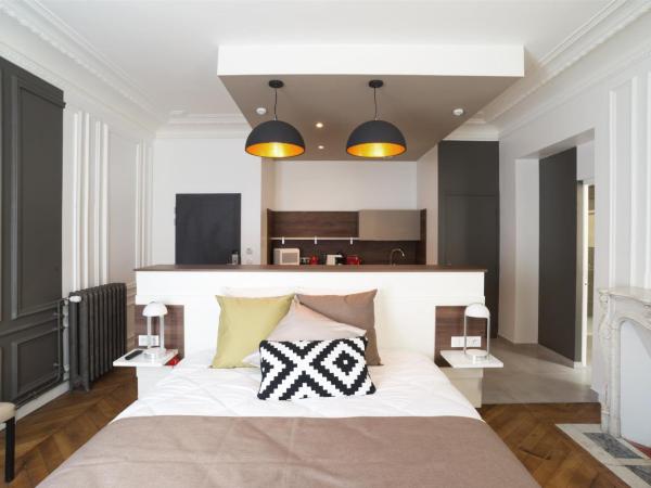 Les cles du 27 Paris : photo 3 de la chambre appartement rotonde