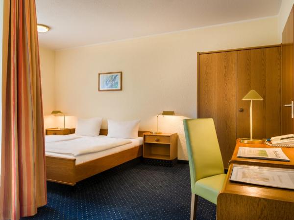 acora Bonn Living the City : photo 1 de la chambre chambre double ou lits jumeaux