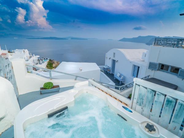 Kaleidoscope Cave Houses : photo 1 de la chambre maison troglodyte 1 chambre avec bain à remous extérieur - vue sur caldeira