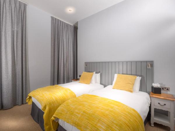 Edgar Townhouse : photo 10 de la chambre chambre lits jumeaux spacieuse