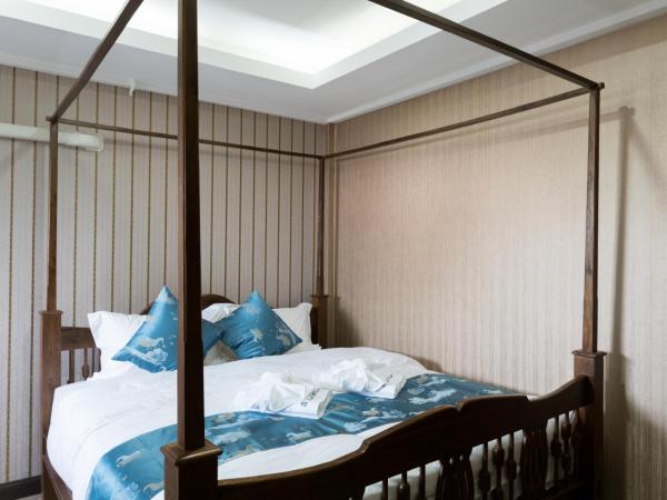 A Lanna Boutique House : photo 7 de la chambre chambre lit king-size standard