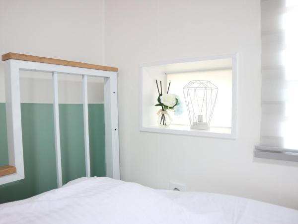 24 Guesthouse Seoul Station : photo 2 de la chambre chambre lits jumeaux