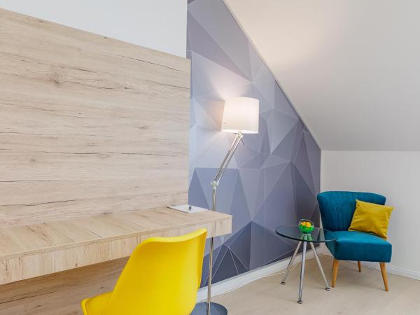 Christina Residence : photo 10 de la chambre chambre deluxe double ou lits jumeaux