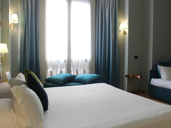 Hotel Continental Genova : photo 5 de la chambre chambre triple