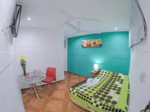 Hotel San Carlos : photo 2 de la chambre chambre deluxe (2 adultes + 1 enfant)